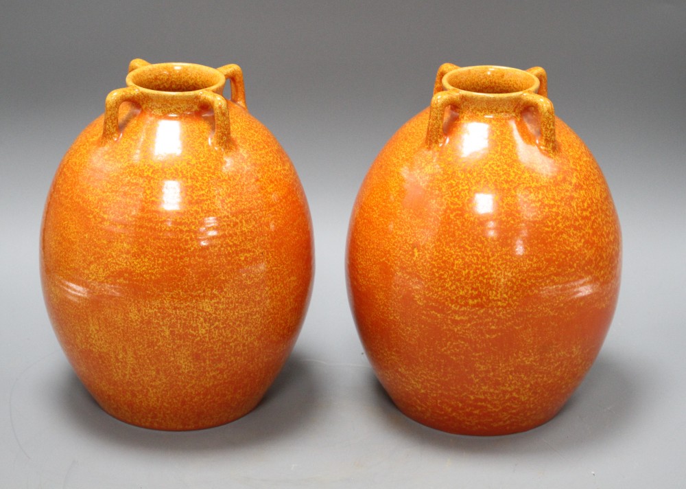 A pair of Royal Lancastrian speckle orange glazed vases, impressed 3134, height 22cm